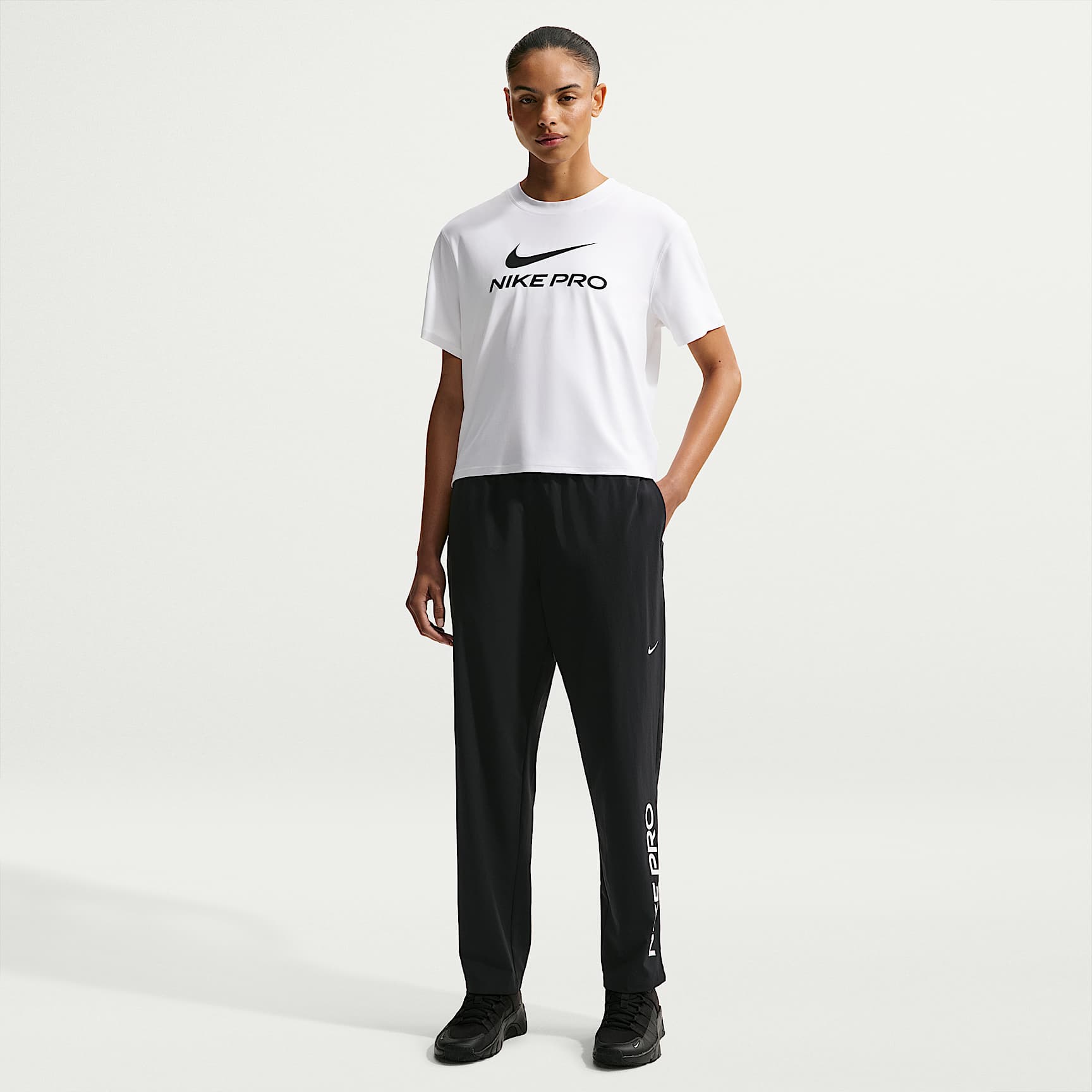 Nike Pro 365 Women's Dri-FIT Mid-Rise Woven Pants. Nike.com